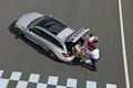 Mercedes E63 AMG Estate gris 3/4 arrière gauche + kart vue de haut