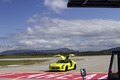 Mercedes SLS AMG E-Cell jaune 3/4 avant gauche portes ouvertes debout