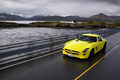 Mercedes SLS AMG E-Cell jaune 3/4 avant gauche travelling vue de haut penché