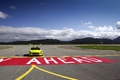 Mercedes SLS AMG E-Cell jaune face avant portes ouvertes