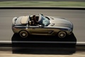Mercedes SLS AMG roadster - marron - profil droit ouvert dynamique