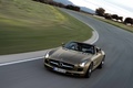 Mercedes SLS AMG Roadster marron satiné 3/4 avant gauche travelling penché