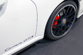 Mondial de l'Automobile Paris 2010 - Porsche 997 Carrera GTS blanc logo aile
