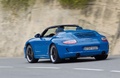 Porsche 997 Speedster bleu 3/4 arrière gauche filé penché