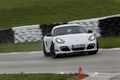 Porsche Cayman R blanc 3/4 avant droit filé penché