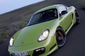 Porsche Cayman R vert 3/4 avant gauche travelling penché debout