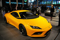 Mondial de l'Automobile Paris 2010 - Lotus Elan orange 3/4 avant droit