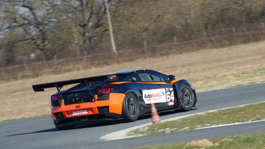 Lamborghini Gallardo GT3 noir/orange 3/4 arrière droit penché