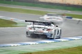 Mercedes SLS AMG GT3 gris 3/4 arrière droit filé penché