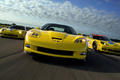 Chevrolet Corvette C6 ZR1 jaune & 2x C6R jaune/noir face avant travelling