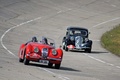 Raid Suisse-Paris 2012 - Jaguar XK120 Roadster rouge 3/4 avant droit