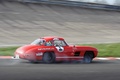 Rallye de Paris Classic 2012 - Mercedes 300 SL rouge 3/4 arrière droit filé