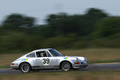 Porsche 911 Carrera gris 3/4 avant droit filé 