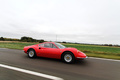 Ferrari 246 GT Dino rouge profil travelling penché