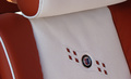 Alpina B6s blanc/orange logo siège