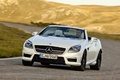 Mercedes SLK 55 AMG blanc 3/4 avant gauche filé penché