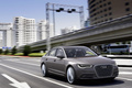 Audi A6 e-Tron marron 3/4 avant droit travelling