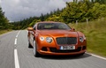 Bentley Continental GT 2010 orange 3/4 avant droit travelling