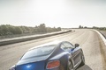 Bentley Continental GT Speed bleu 3/4 arrière droit penché debout