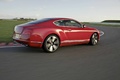 Bentley Continental GT V8 rouge 3/4 arrière droit travelling