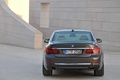 BMW 750Li MY2012 marron face arrière
