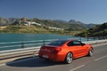 BMW M6 orange 3/4 arrière droit travelling