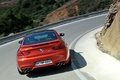 BMW M6 orange face arrière travelling penché