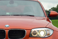 Essai BMW Série 1 M Coupé - orange - détail, phare avant