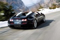Bugatti Veyron Grand Sport VItesse noir 3/4 arrière gauche travelling penché