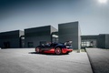 Bugatti Veyron Grand Sport Vitesse noir/orange 3/4 arrière gauche