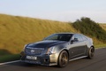Cadillac CTS-V Coupe anthracite 3/4 avant gauche travelling