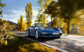 Porsche 991 Carrera 4 Cabriolet bleu 3/4 avant droit travelling 