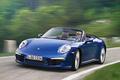 Porsche 991 Carrera 4 Cabriolet bleu 3/4 avant gauche travelling penché