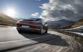 Porsche 991 Carrera 4S marron 3/4 arrière droit travelling penché 2