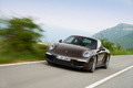 Porsche 991 Carrera 4S marron 3/4 avant gauche travelling penché