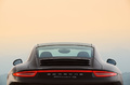 Porsche 991 Carrera 4S marron face arrière coupé