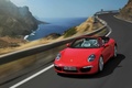 Porsche 991 Carrera S Cabriolet rouge 3/4 avant gauche travelling