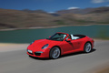 Porsche 991 Carrera S Cabriolet rouge 3/4 avant gauche travelling