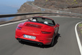 Porsche 991 Carrera S Cabriolet rouge face arrière travelling penché
