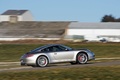 Porsche 991 Carrera S gris 3/4 arrière droit filé penché