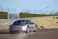 Porsche 991 Carrera S gris 3/4 arrière droit penché