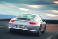 Porsche 991 Carrera S gris 3/4 arrière droit travelling penché 2