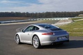 Porsche 991 Carrera S gris 3/4 arrière gauche travelling penché 2