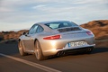 Porsche 991 Carrera S gris 3/4 arrière gauche travelling penché