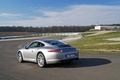 Porsche 991 Carrera S gris 3/4 arrière gauche travelling penché