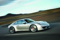 Porsche 991 Carrera S gris 3/4 avant droit travelling penché 2