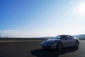 Porsche 991 Carrera S gris 3/4 avant gauche travelling 2