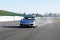 Porsche 991 Carrera S gris 3/4 avant gauche travelling 3