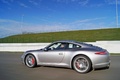 Porsche 991 Carrera S gris profil travelling 2