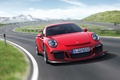 Porsche 991 GT3 rouge 3/4 avant droit travelling penché